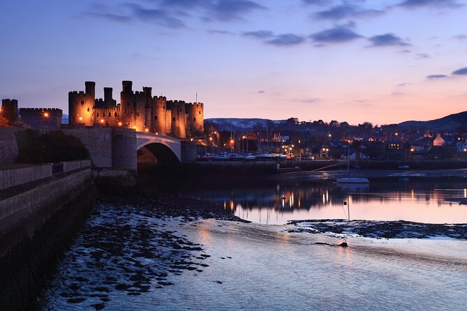 Llandudno Gateway: Snowdonia, Castles & Portmeirion Day Tour - Caernarfon Castle: royal scale and strong presence