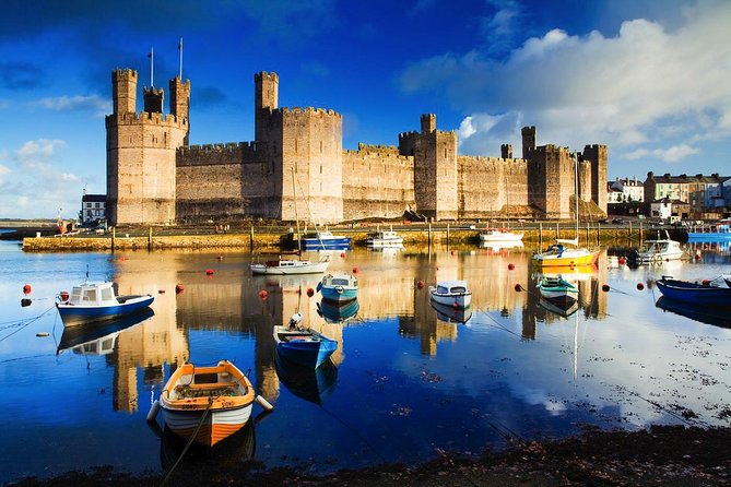 Portmeirion, Castles and Snowdonia Tour - Caernarfon: World Heritage Fortress Vibes and the Menai Waterline